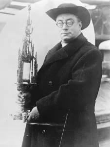 English High Church official arrives in America. The Right Reverend Monsignor Newsome of England English High Church official arrives in America. The Right Reverend Monsignor Newsome of England