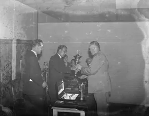 Famous cricketer Leslie Ames presenting prizes to G Nancolas at the Erith Hospital Famous cricketer Leslie Ames presenting prizes to G Nancolas at the Erith Hospital