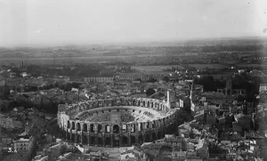 Famous old world town devastated by fire. Historic buildings may be involved. Arles Famous old world town devastated by fire. Historic buildings may be involved. Arles