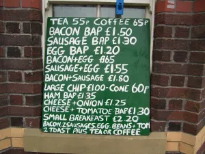 Handwritten breakfast menu on a board outside a cafe, Rhyl, Denbighshire, North Wales Handwritten breakfast menu on a board outside a cafe, Rhyl, Denbighshire, North Wales