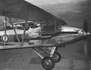 A Hawker Demon biplane of the RAF flying in formation over Kent. 1935 A Hawker Demon biplane of the RAF flying in formation over Kent. 1935