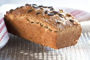 Homemade wholemeal loaf topped with pumpkin seeds, cooling on wire rack credit Homemade wholemeal loaf topped with pumpkin seeds, cooling on wire rack credit