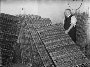 Howitzer mat making by Mr Hewett at Swanley Basket Works, Kent. 1938 Howitzer mat making by Mr Hewett at Swanley Basket Works, Kent. 1938