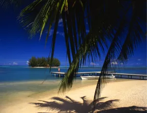 Islet off Morea, with a jetty. Morea is itself an island of Tahiti Islet off Morea, with a jetty. Morea is itself an island of Tahiti