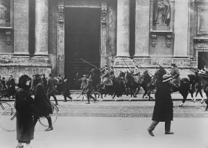 Keeping order in Munich : crowds dispersed by cavalry. The German Imperial Defence Corp Keeping order in Munich : crowds dispersed by cavalry. The German Imperial Defence Corp