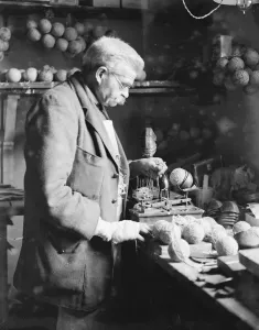 The making of cricket balls at London football company station road, South Norwood Weighing The making of cricket balls at London football company station road, South Norwood Weighing