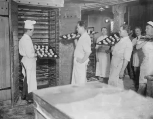 The making of hot cross buns at R E Jones Ltd Into the oven 28 March 1923 The making of hot cross buns at R E Jones Ltd Into the oven 28 March 1923