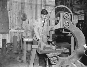 Manufacture of cork balls at Chingford Sawing cork blocks 28 November 1922 Manufacture of cork balls at Chingford Sawing cork blocks 28 November 1922