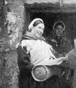 <b class=qtipBold><figcaption>Mono Negative</figcaption></b><br>The Evacuation of St Kilda: Island types; And scenes of departure. A St Kilda woman selling homespun tweed. 6 September 1930 Scotland, Outer Hebrides Scottish history Mono Negative