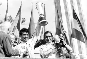 Monza, Italy: Brian Redman and Jo Siffert hold aloft their trophies after winning the 1, 000 KMS Monza, Italy: Brian Redman and Jo Siffert hold aloft their trophies after winning the 1, 000 KMS