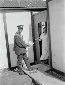 Mr Freathy delivering post to people who live near the shingle beach at Dungeness Mr Freathy delivering post to people who live near the shingle beach at Dungeness