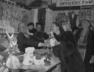 Mr Leslie Kenson and Miss Jessie Matthews in a spot of bother at sale of work by Mr Leslie Kenson and Miss Jessie Matthews in a spot of bother at sale of work by