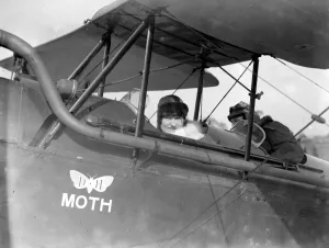 Mrs Alan Cobham leaving Stag Lane Aerodrome to meet her husband in mid air. 13 March Mrs Alan Cobham leaving Stag Lane Aerodrome to meet her husband in mid air. 13 March