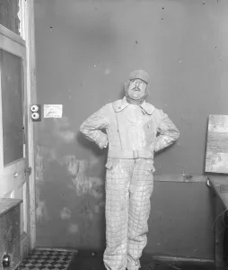 A new suit for flying men. It won t burn, won t sink and keeps out the cold A new suit for flying men. It won t burn, won t sink and keeps out the cold
