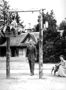 Prince Charles & Princess Anne chuckle delightedly on the swing at Balmoral Castle Prince Charles & Princess Anne chuckle delightedly on the swing at Balmoral Castle