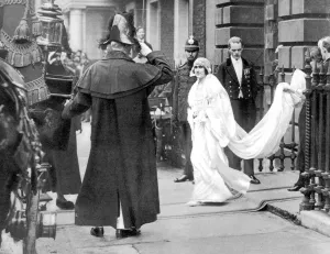 Queen Elizabeth then Lady Elizabeth Bowes Lyon about to enter the carriage in which Queen Elizabeth then Lady Elizabeth Bowes Lyon about to enter the carriage in which