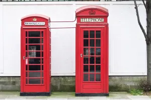 Two red telephone boxes of different vintages in London, UK credit: Marie-Louise Two red telephone boxes of different vintages in London, UK credit: Marie-Louise