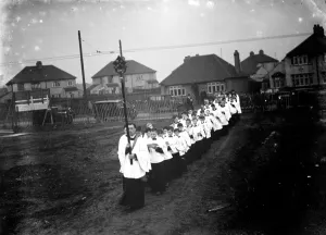 The religious procession leading to the church hall opening in Barnehurst, Kent The religious procession leading to the church hall opening in Barnehurst, Kent