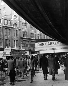 The shoppers are well wrapped up against Londons draughty climate, Kensington High Street The shoppers are well wrapped up against Londons draughty climate, Kensington High Street