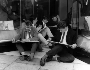 This sit down did not carry a protest - the boys are students taking advantage of This sit down did not carry a protest - the boys are students taking advantage of