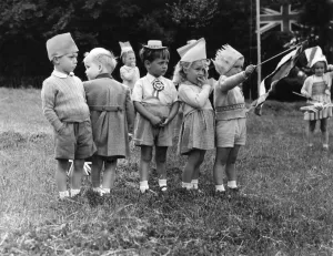 Small children bewildered by it all during the Coronation celebrations at Bexley Small children bewildered by it all during the Coronation celebrations at Bexley