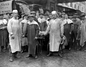 Smithfield Market meat porters in new headgear and smocks, approved by Minister of Health Smithfield Market meat porters in new headgear and smocks, approved by Minister of Health