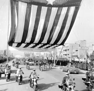 Teheran: The motor cavalcade containing President Eisenhower and the Shah of Persia Teheran: The motor cavalcade containing President Eisenhower and the Shah of Persia