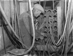 Telephone cables are being laid underground by workers in Chislehurst, Kent Telephone cables are being laid underground by workers in Chislehurst, Kent