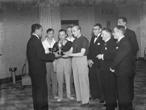 The trophy presentation at table tennis final in Deptford, Kent. 1939 The trophy presentation at table tennis final in Deptford, Kent. 1939