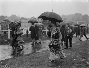 Wet Ascot. A visitor who went prepared for the rain. 18 June 1930 Wet Ascot. A visitor who went prepared for the rain. 18 June 1930