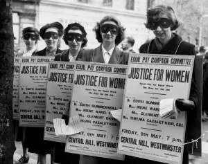 Women campaigned to share the growing affluence in 1952. Masked women took part Women campaigned to share the growing affluence in 1952. Masked women took part