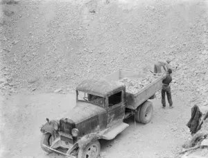 Workers are loading up a Bedford truck at the Lime Works in Dunton Green, Kent Workers are loading up a Bedford truck at the Lime Works in Dunton Green, Kent