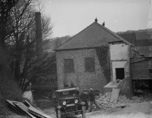 Workmen demolishing the old paper mill at Shoreham, Kent with a Bedford lorry out Workmen demolishing the old paper mill at Shoreham, Kent with a Bedford lorry out