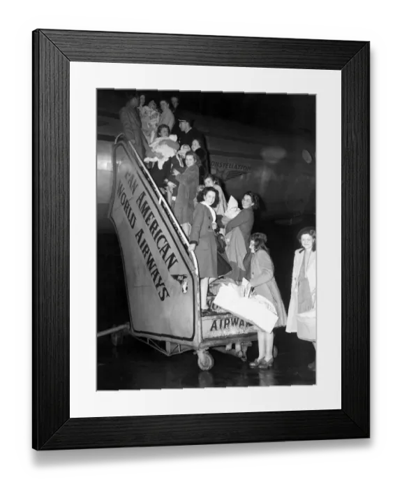 Framed Print : G. I. brides catching a plane to New York. London Heathrow 24th December 1946 Framed Print : G. I. brides catching a plane to New York. London Heathrow 24th December 1946