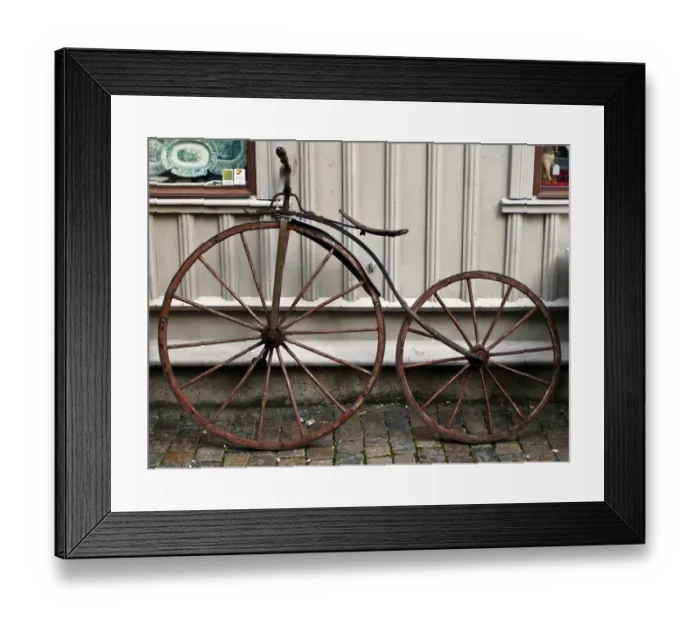 Framed Print : Early bicycle against wooden painted wall of antique shop in Haga district of Gothenburg Framed Print : Early bicycle against wooden painted wall of antique shop in Haga district of Gothenburg