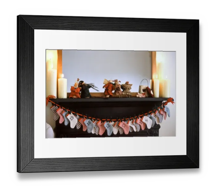 Framed Print : Chimneypiece decorated for Christmas with advent calender made of little xmas stockings Framed Print : Chimneypiece decorated for Christmas with advent calender made of little xmas stockings