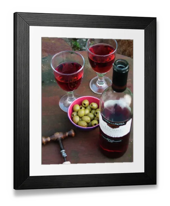 Framed Print : Rose wine with green oliives in garden on summer evening credit: Marie-Louise Avery Framed Print : Rose wine with green oliives in garden on summer evening credit: Marie-Louise Avery