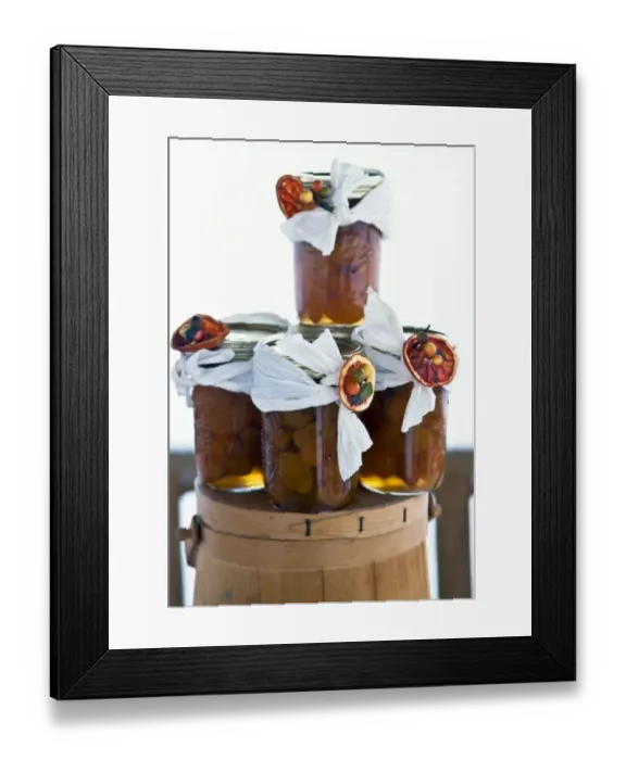 Framed Print : Jars of spiced dried apricots in brandy, decorated as christmas gifts. credit Framed Print : Jars of spiced dried apricots in brandy, decorated as christmas gifts. credit