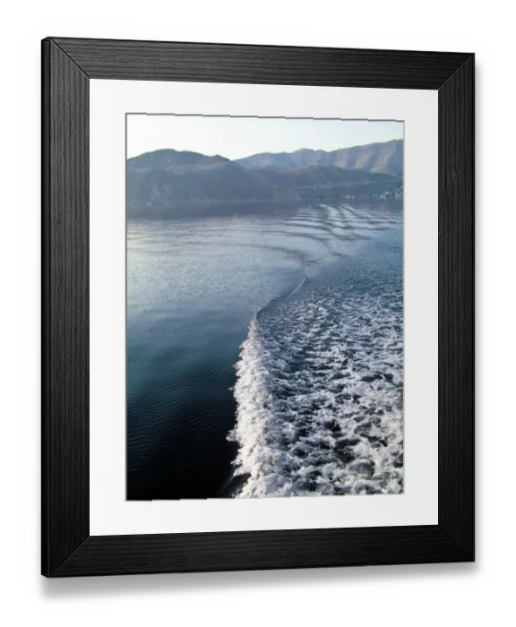 Framed Print : Looking back at the wake of Turkish gulet sailing among Greek islands in early morning Framed Print : Looking back at the wake of Turkish gulet sailing among Greek islands in early morning