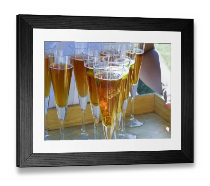 Framed Print : Tray of champagne cocktails at summer, outdoor wedding credit: Marie-Louise Avery