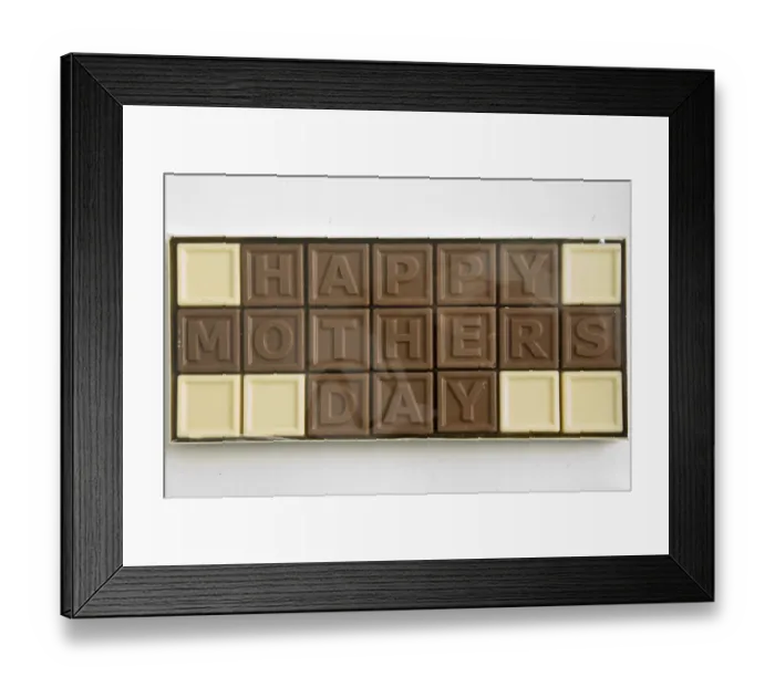 Framed Print : Chocolate letters spelling Happy Mothers Day in cellophane box as Mothers day