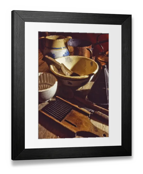 Framed Print : A collection of old and antique kitchenalia, tools and equipment including jugs, bowls Framed Print : A collection of old and antique kitchenalia, tools and equipment including jugs, bowls