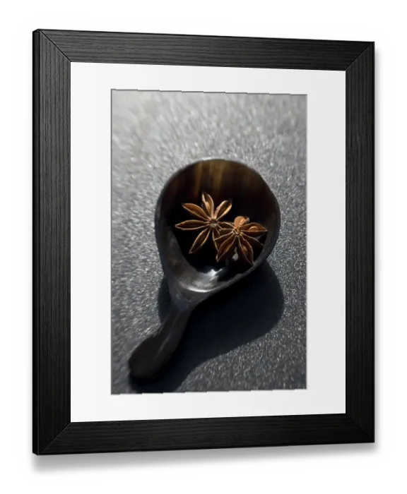 Framed Print : Dried Star anise fruits in small bowl. Also known as star aniseed, badiane or Chinese