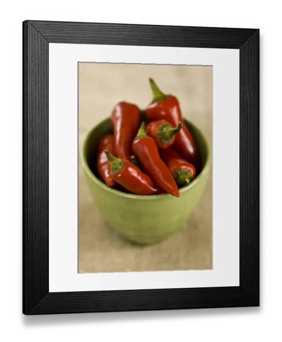 Framed Print : Red hot chilli peppers in green bowl credit: Marie-Louise Avery  /  thePictureKitchen