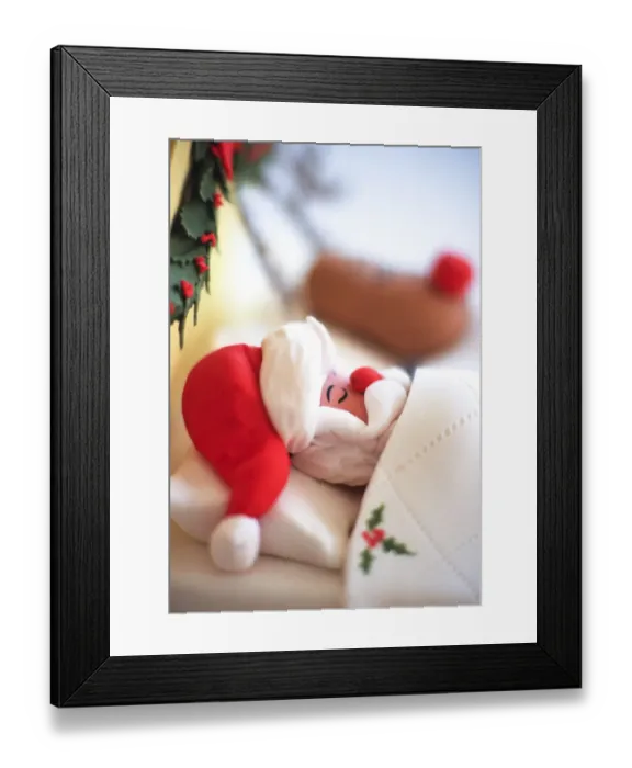 Framed Print : Santa and Rudolph the red-nosed reindeer sleeping in bed made of icing - Christmas Framed Print : Santa and Rudolph the red-nosed reindeer sleeping in bed made of icing - Christmas
