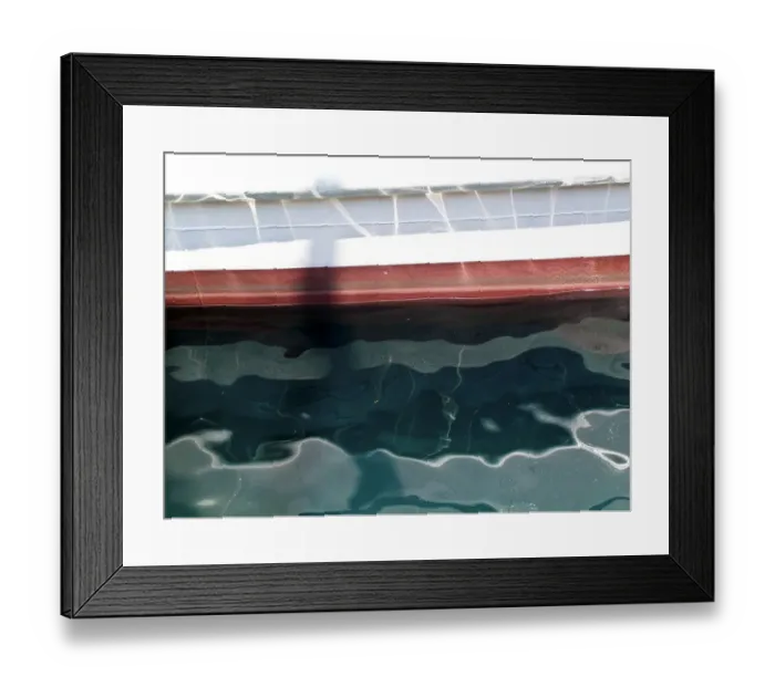 Framed Print : Detail of painted boat at water line showing reflections and ripples credit: Marie-Louise