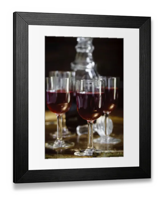 Framed Print : A tray of glasses of sloe gin with unstoppered decanter. credit: Marie-Louise Avery Framed Print : A tray of glasses of sloe gin with unstoppered decanter. credit: Marie-Louise Avery