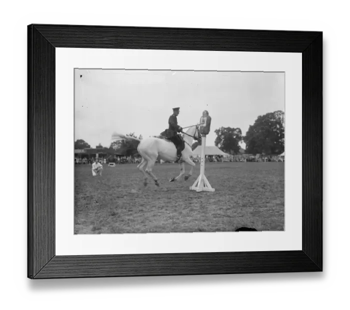 Framed Print : A mounted policeman competing in the truncheon event at the Metropolitan Framed Print : A mounted policeman competing in the truncheon event at the Metropolitan