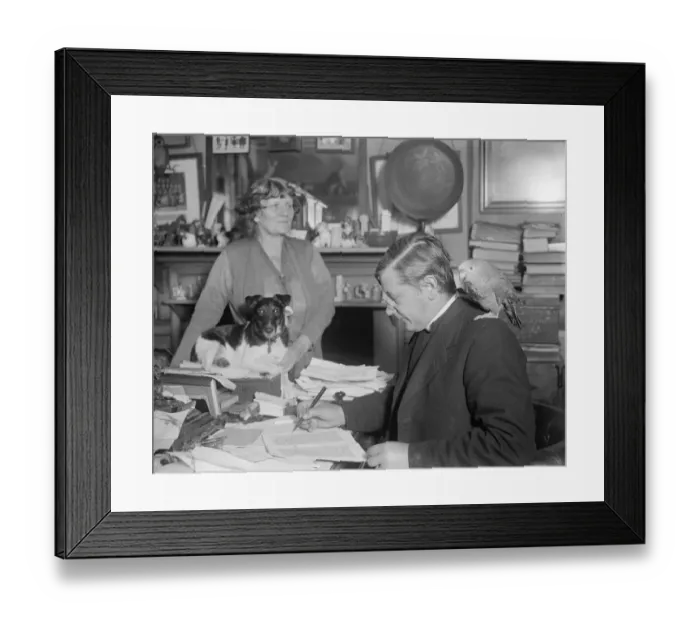 Framed Print : The Parish pets. Fox terrier and parrot attends all meetings. Rev Pennington Bickford