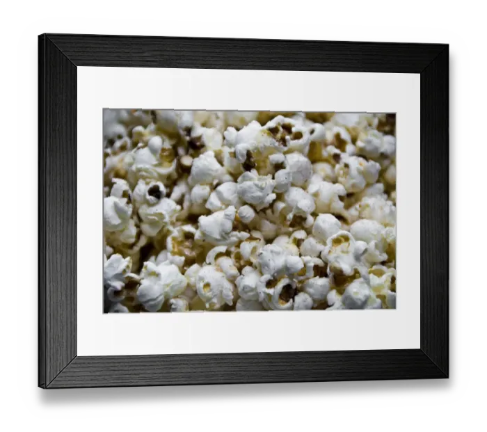 Framed Print : Close up of freshly popped popcorn credit: Marie-Louise Avery  /  thePictureKitchen